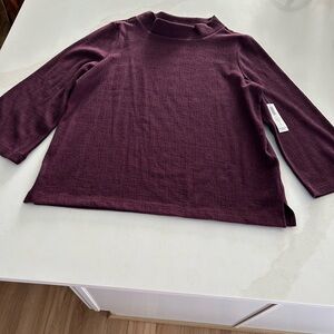 Chicos Women's Long Sleeve Top in royal bordeaux.